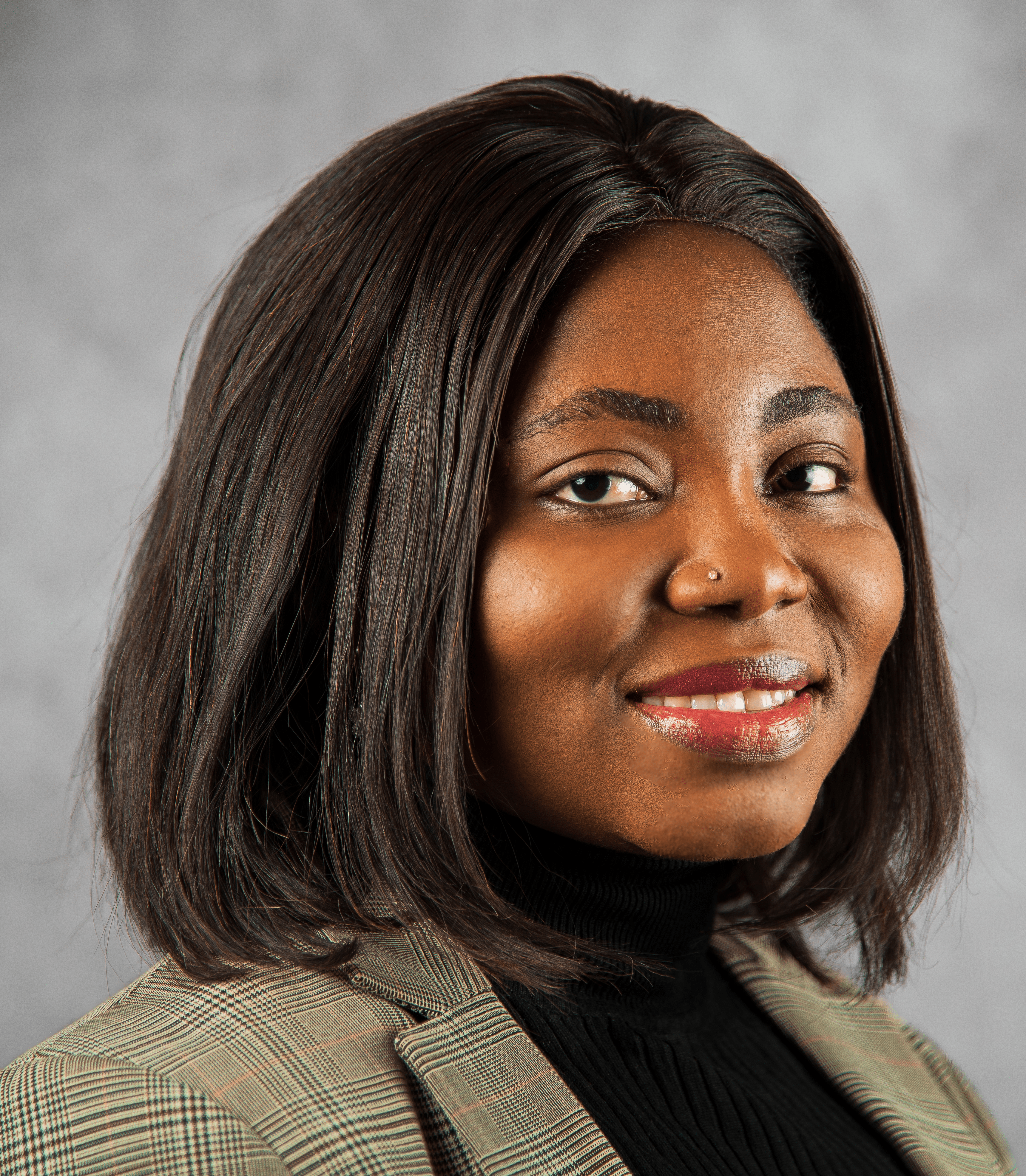 Headshot session of a female smiling for the camera in Moncton, NB.