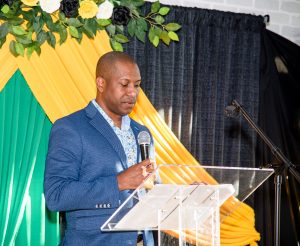 Event photography: Speaker delivering speech at O'creek Brewing Co. event in Moncton, NB