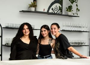 Three ladies posing for the camera at O'Creek Brewing Co. in Moncton, NB. Event photography available in Saint John, Fredericton, and surrounding areas.